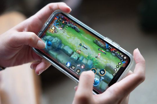 Smartphone with colourful fictional mobile game