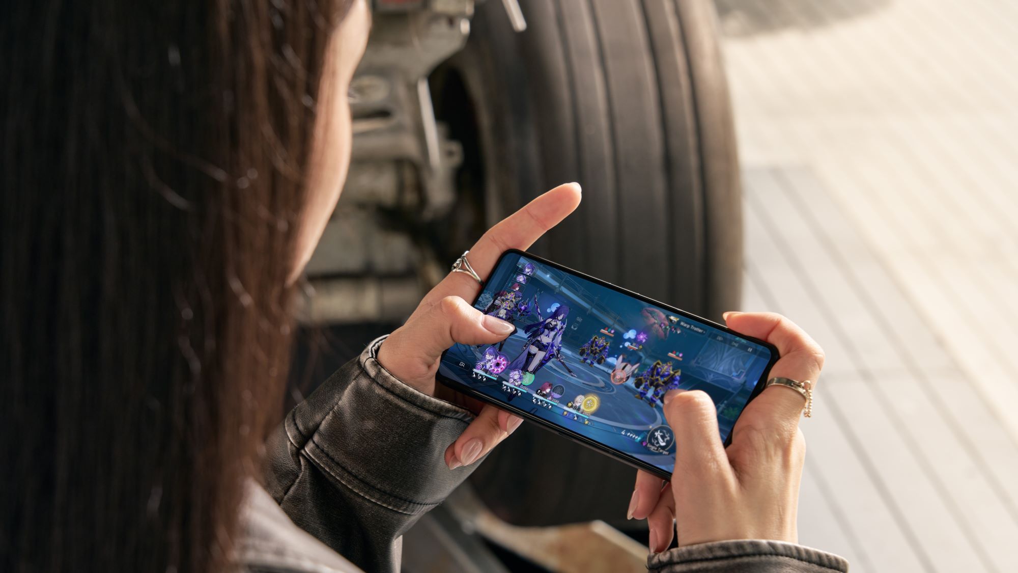 Large smartphone showing a CROWN gaming screen